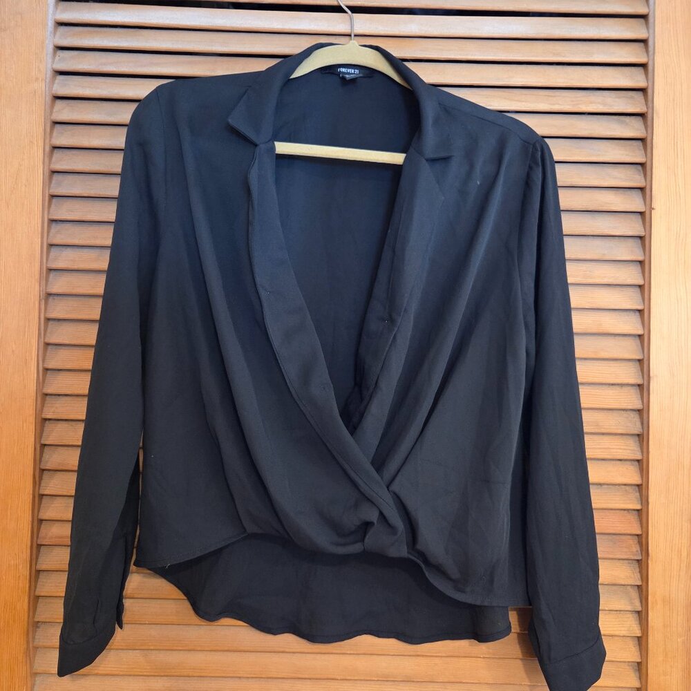 low cut black blouse